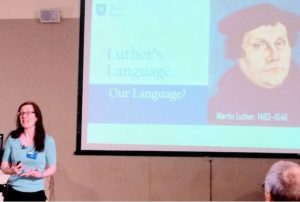 Iona, pictured at the beginning of a talk about Martin Luther's language.